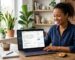 Small business owner at desk smiling at laptop showing WordPress SEO dashboard with local map pin