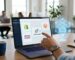 Modern ecommerce workspace with a laptop displaying SEOLocal dashboard, Shopify, WooCommerce, and Magento integration icons, a translucent holographic AI agent icon hovering, and a human hand touching the screen to deploy an agent, set in a bright airy office with subtle technology accents.