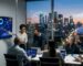 Professional photograph of Los Angeles skyline at dusk with digital SEO and AI overlays, diverse marketing team analyzing data in modern office