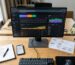 Overhead view of a modern workspace with SEO monitoring tools and a roadmap for strategic planning.