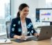 Digital marketing strategist working at modern desk with holographic icons of backlinks, social media, and map pins, dashboard with local SEO graphs in background
